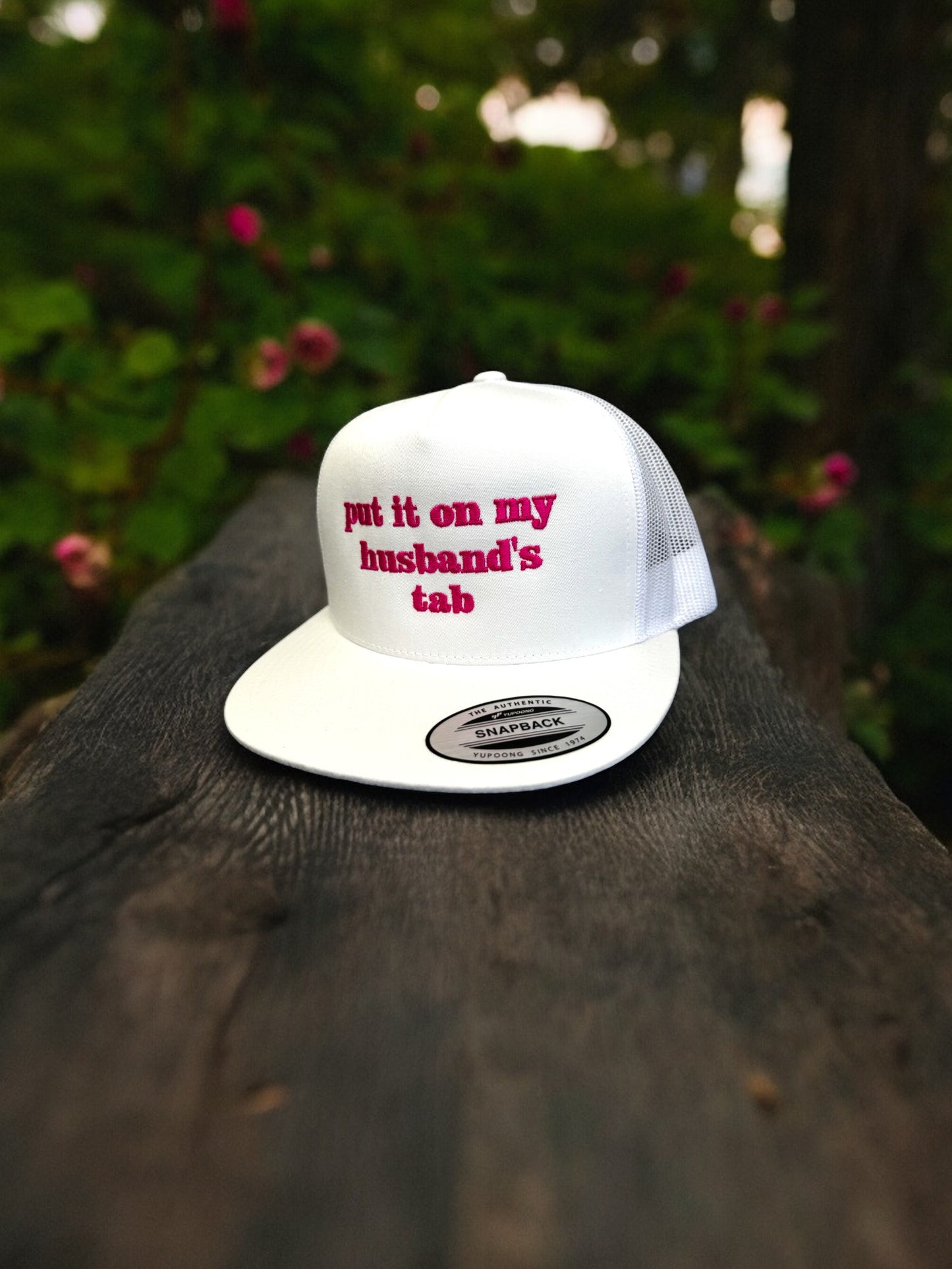 Put It On My Husband's Tab Embroidered Snap Back Trucker Hat